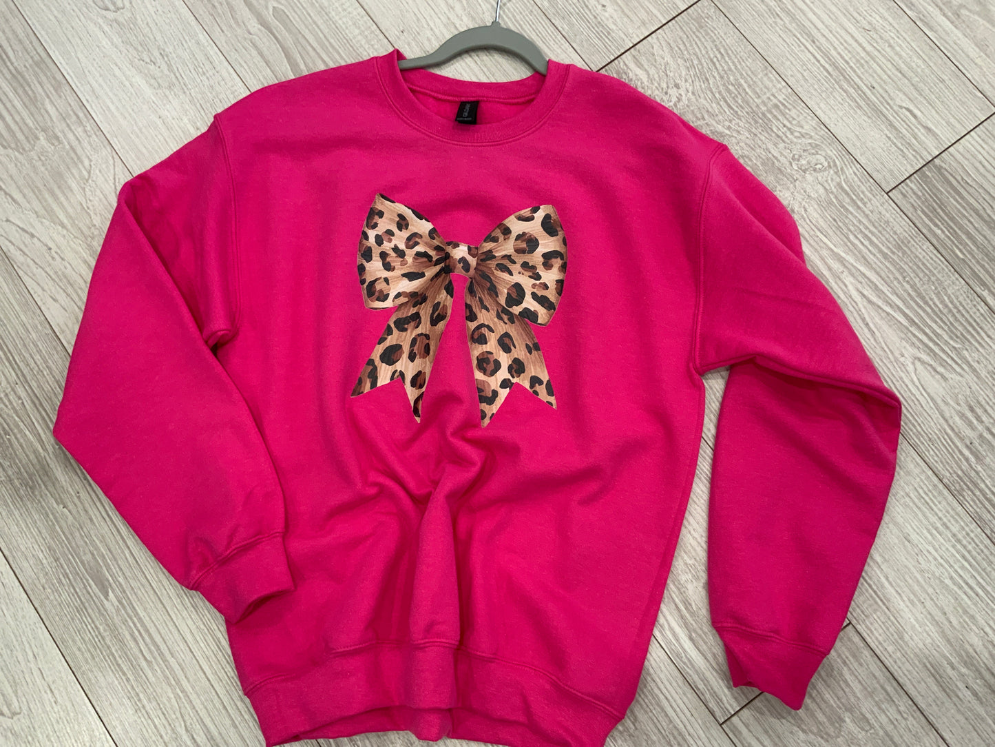 Bright Pink Leopard Bow Crewneck